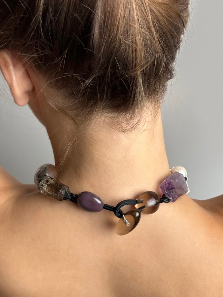 Statement necklace with mixed materials leather chain